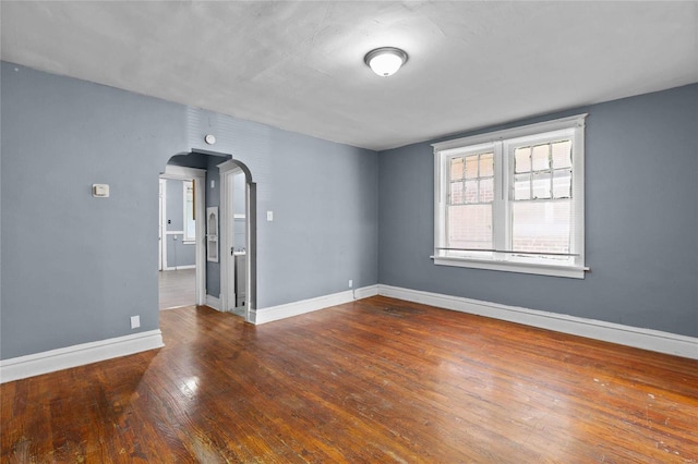 unfurnished room featuring wood-type flooring