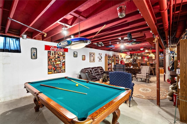 playroom featuring concrete floors and billiards