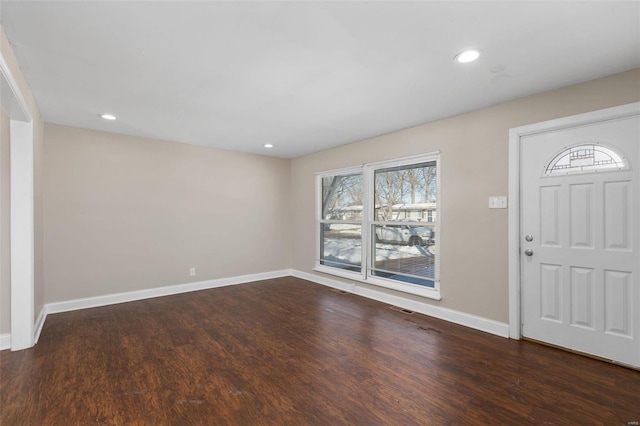 entrance foyer with dark wood-type flooring