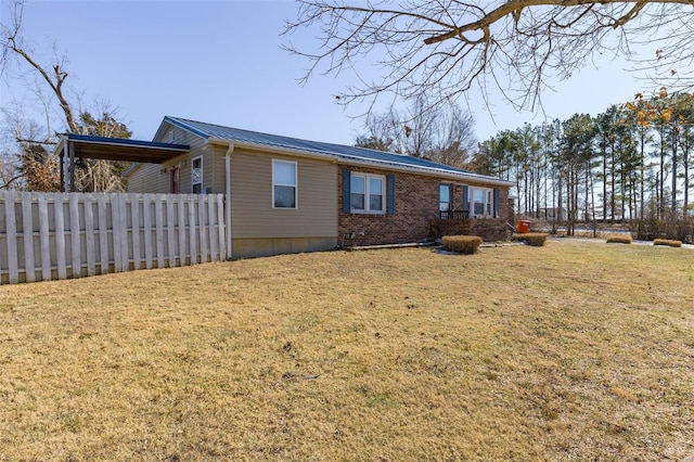 exterior space with a lawn