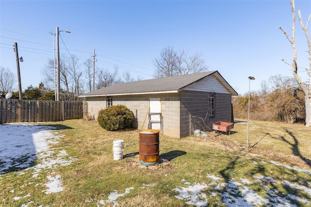 view of outdoor structure with a lawn
