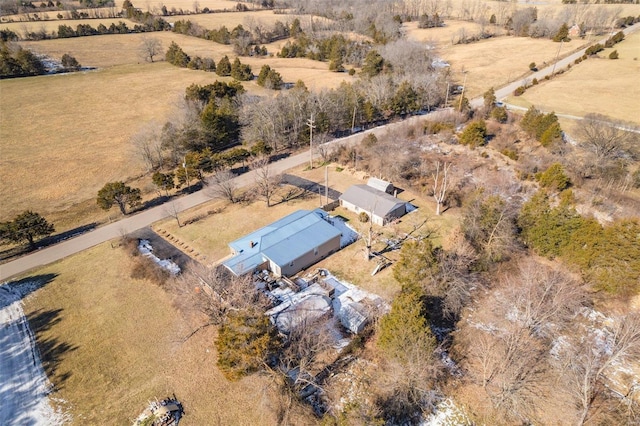 birds eye view of property featuring a rural view