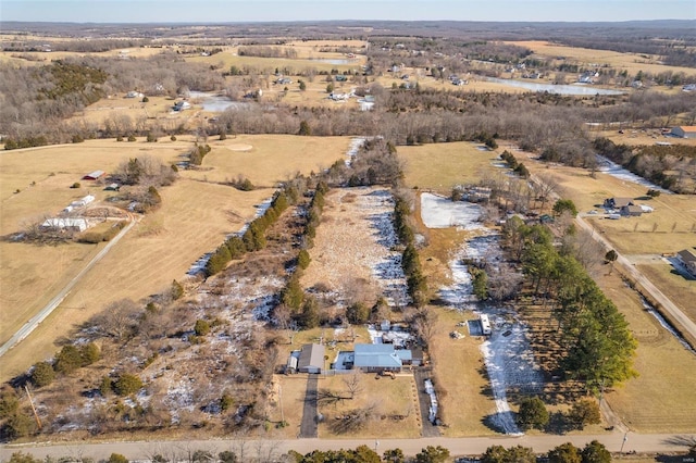 aerial view with a water view and a rural view