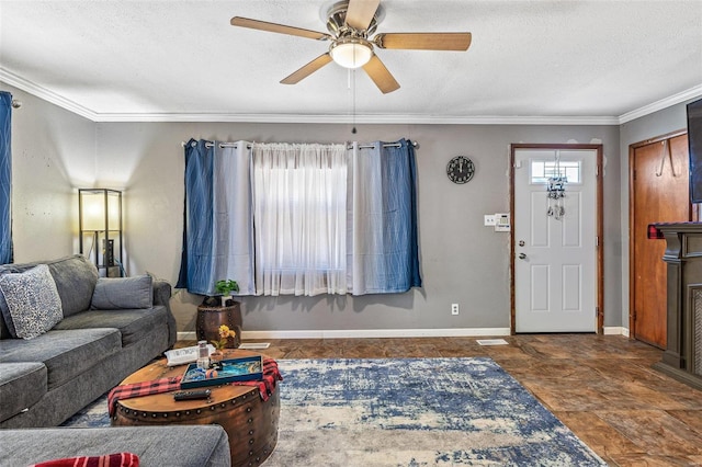 living room with ceiling fan, crown molding, and a textured ceiling