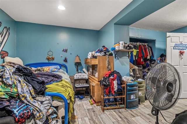 bedroom featuring wood-type flooring