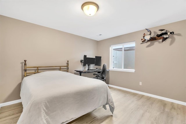 bedroom featuring light hardwood / wood-style floors