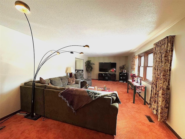 living room featuring carpet flooring and a textured ceiling