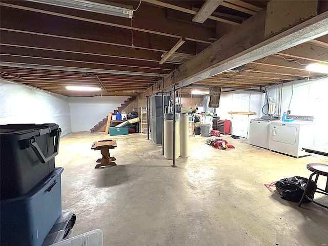 basement with washer and clothes dryer