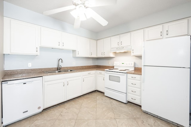 kitchen with sink, white appliances, light tile patterned floors, ceiling fan, and white cabinets