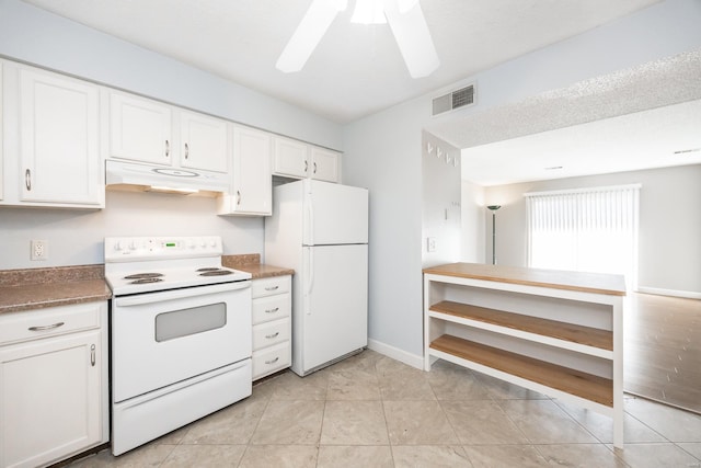 kitchen featuring ceiling fan, white appliances, light tile patterned floors, and white cabinets