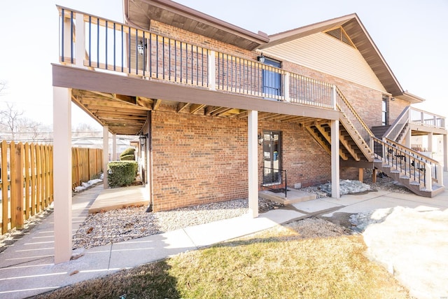 rear view of property with a deck