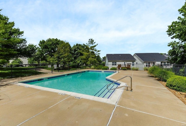 view of swimming pool featuring a patio