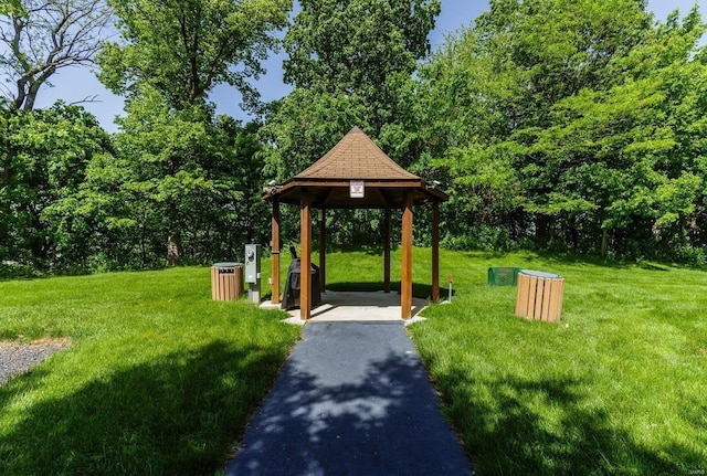 view of property's community featuring a gazebo and a lawn