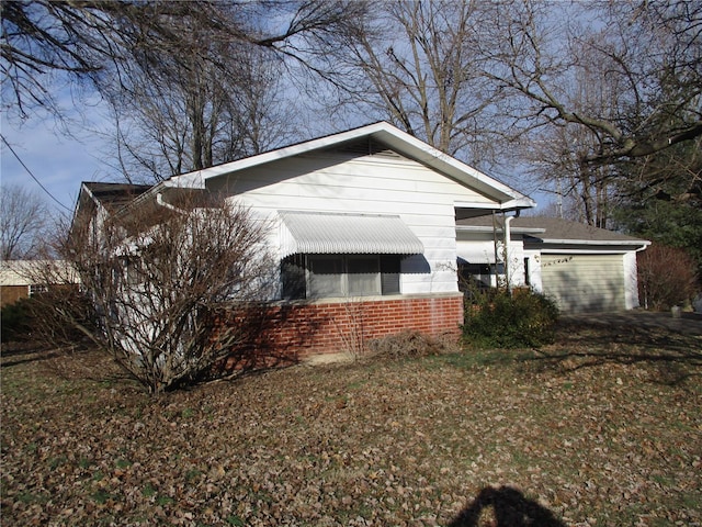 view of home's exterior with a garage