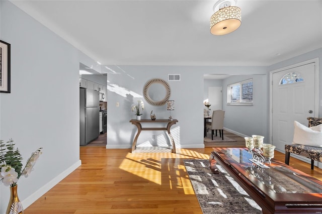 foyer entrance featuring light wood-type flooring