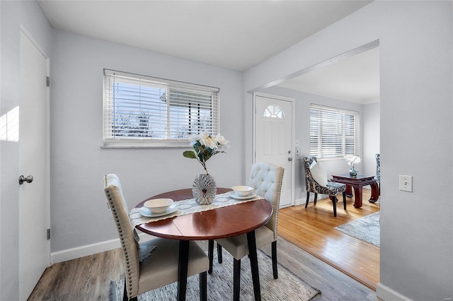 dining area featuring hardwood / wood-style floors