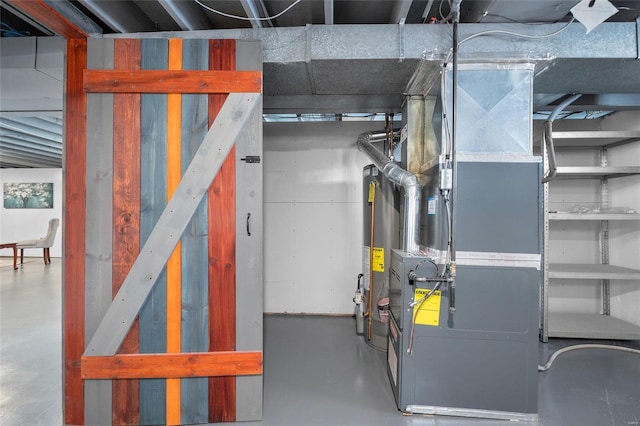 utility room with gas water heater and heating unit