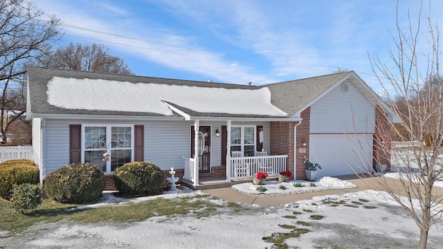 single story home featuring a garage