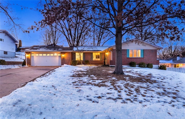 single story home featuring a garage