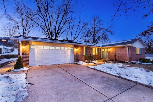 single story home with a garage