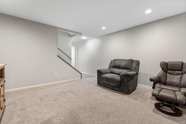 living area with carpet floors