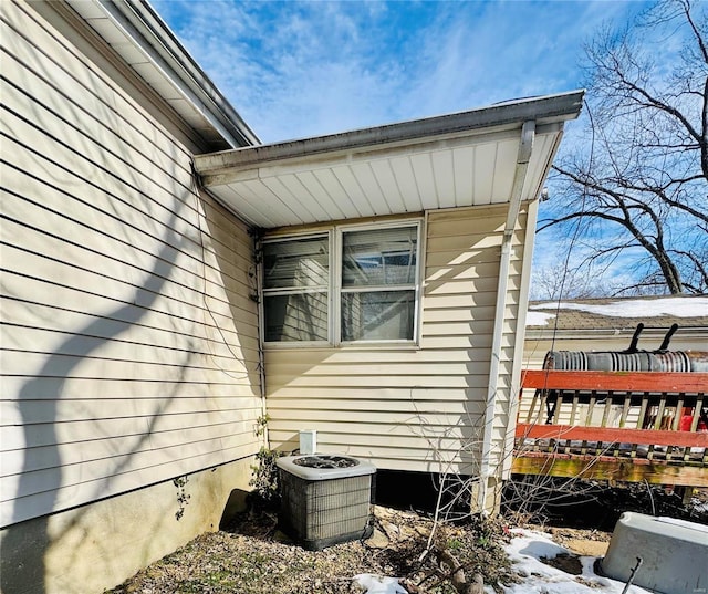 view of property exterior with central AC unit