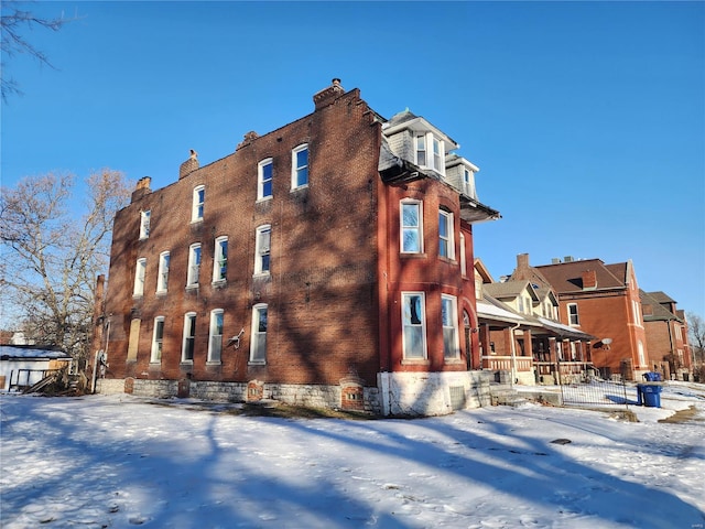 view of snow covered building