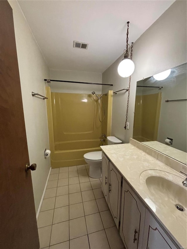 full bathroom featuring tile patterned flooring, vanity, toilet, and shower / tub combination