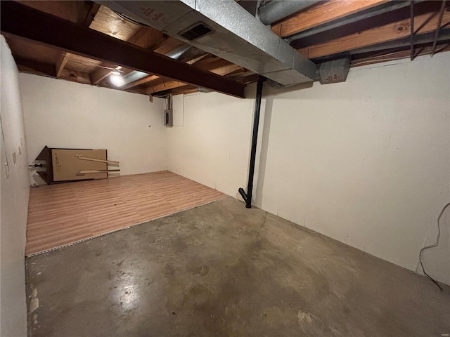 basement with electric panel