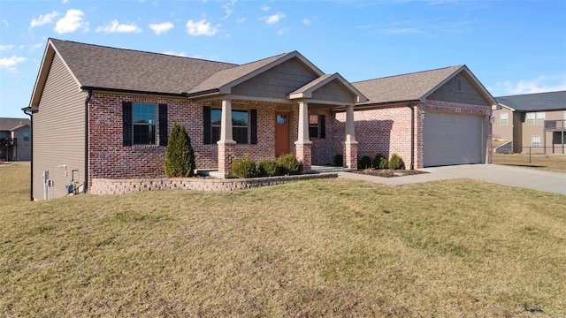 view of front facade with a garage and a front yard