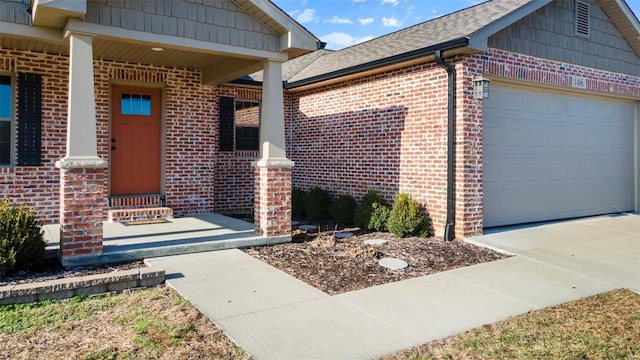 property entrance with a porch and a garage