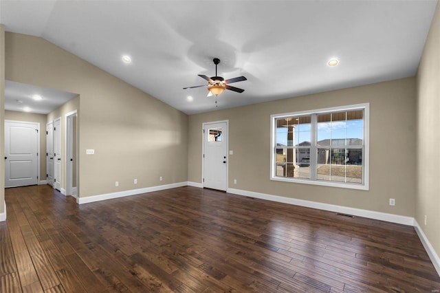 interior space featuring ceiling fan, dark hardwood / wood-style flooring, and vaulted ceiling