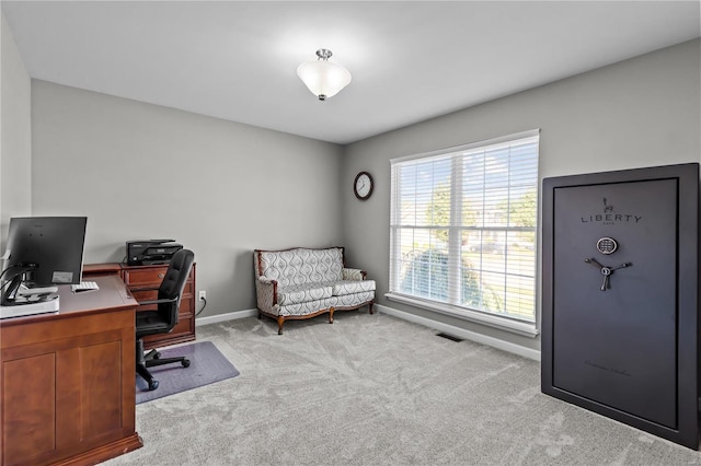 office space with carpet floors, visible vents, and baseboards