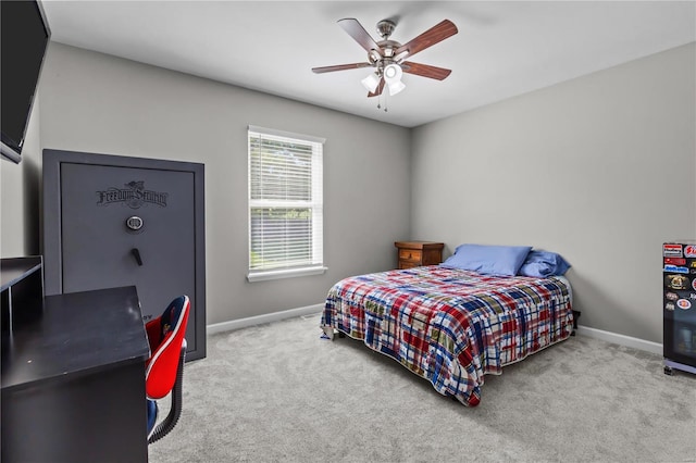 bedroom with carpet, baseboards, and ceiling fan