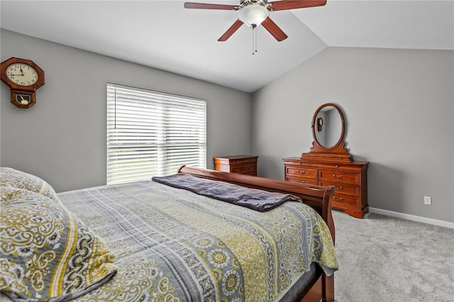 bedroom with lofted ceiling, baseboards, a ceiling fan, and light colored carpet