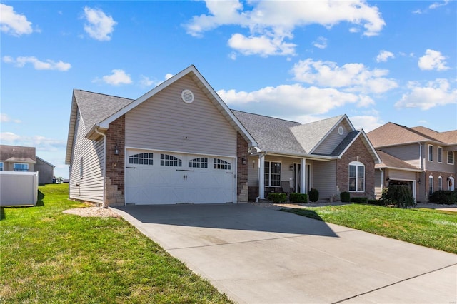 view of front of home with a garage, driveway, a shingled roof, and a front yard