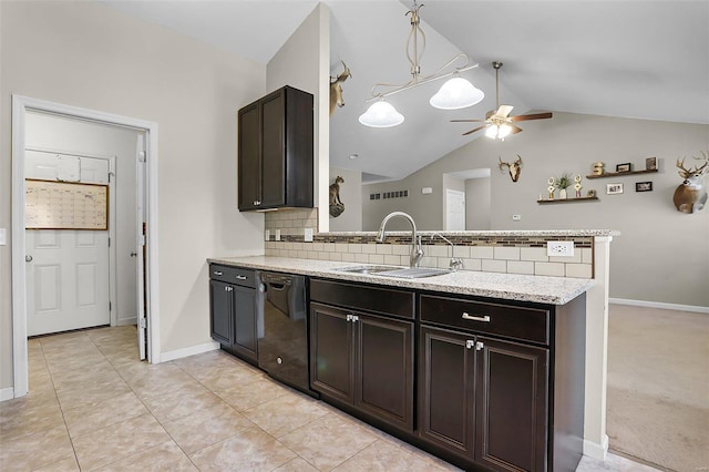 kitchen with sink, black dishwasher, light stone counters, decorative backsplash, and vaulted ceiling