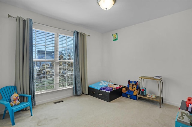 game room featuring carpet floors and a healthy amount of sunlight