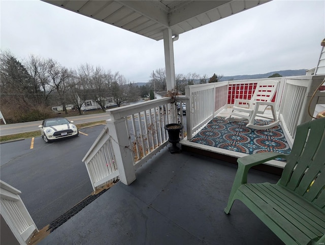 balcony featuring a porch