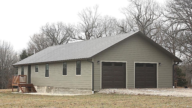 view of property exterior featuring a garage