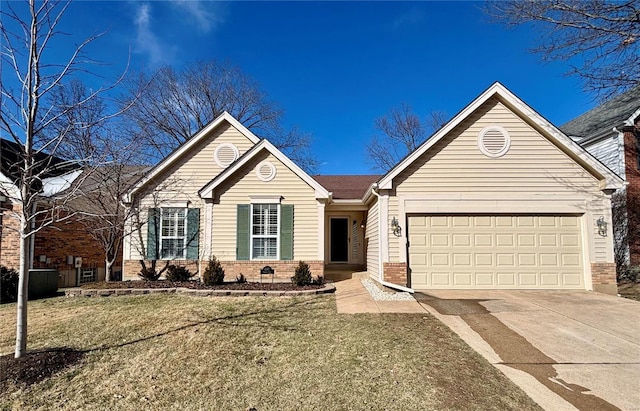 view of front facade featuring a garage and a front yard