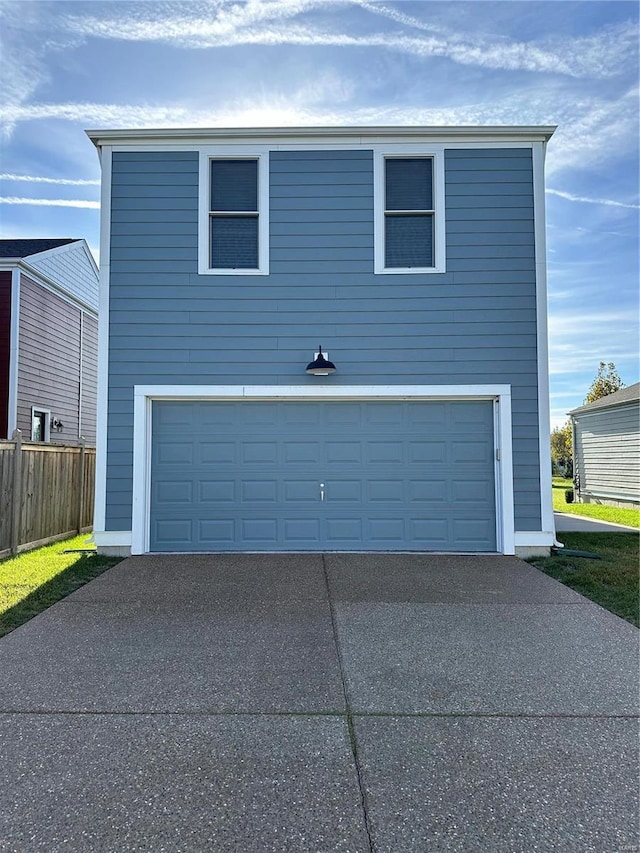 view of front of property with a garage