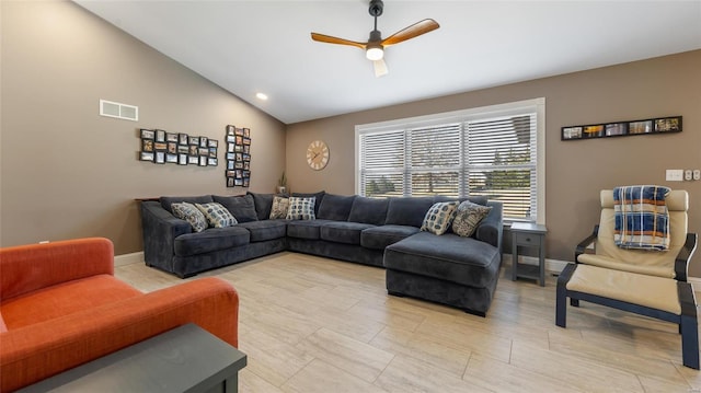 living room featuring lofted ceiling and ceiling fan