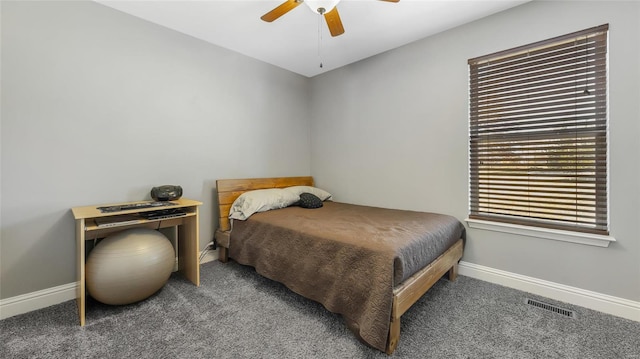 carpeted bedroom with ceiling fan