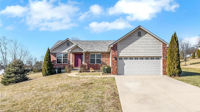 view of front of property featuring a garage and a front yard