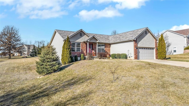 view of front of property with a garage and a front yard