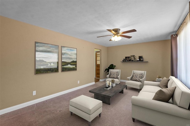 living room with carpet floors and ceiling fan