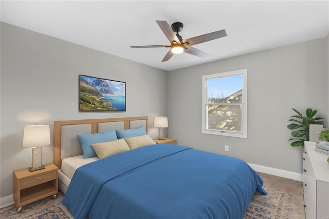 carpeted bedroom featuring ceiling fan