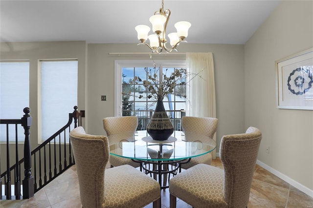 dining room featuring a notable chandelier