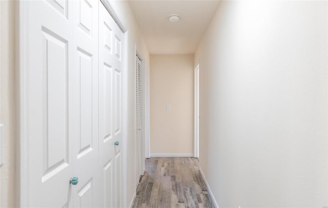 hallway featuring light hardwood / wood-style floors